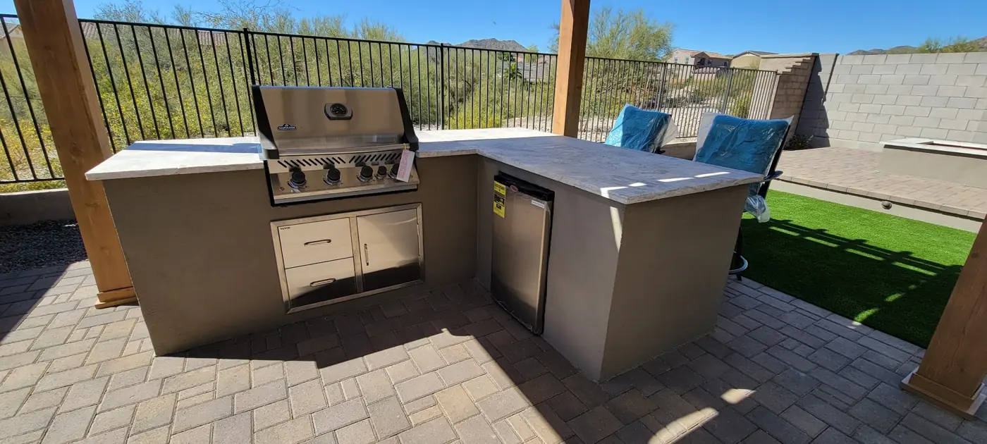 Outdoor kitchen with bar seating