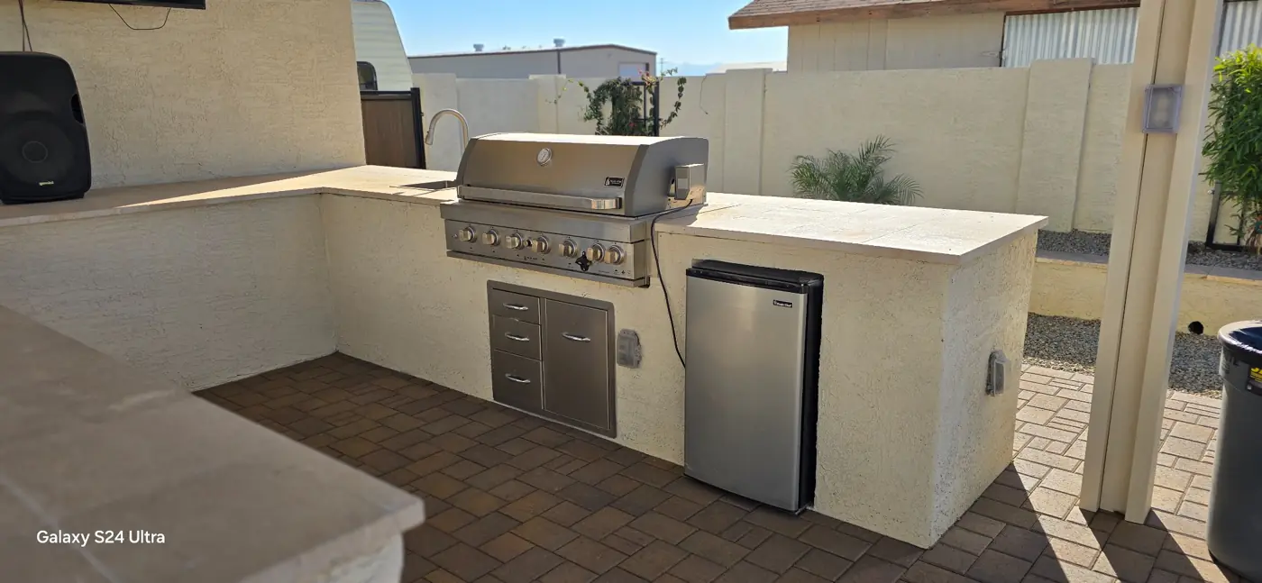 Outdoor grill and entertaining counter