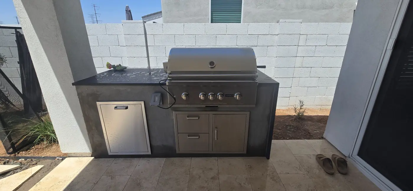 Stainless steel grill and storage island