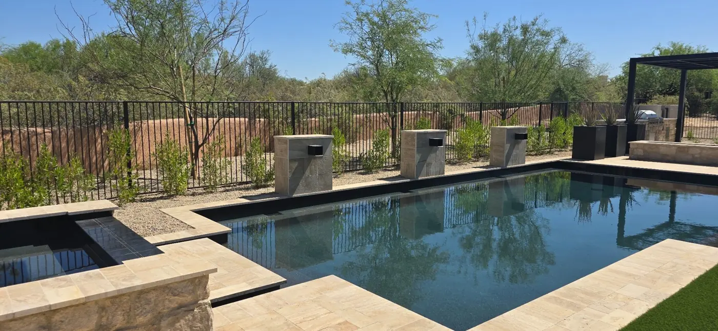 Pool with water features by L and R