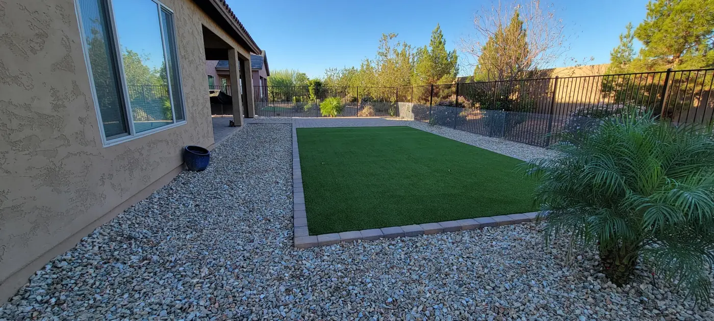 Turf inset and decorative rock border