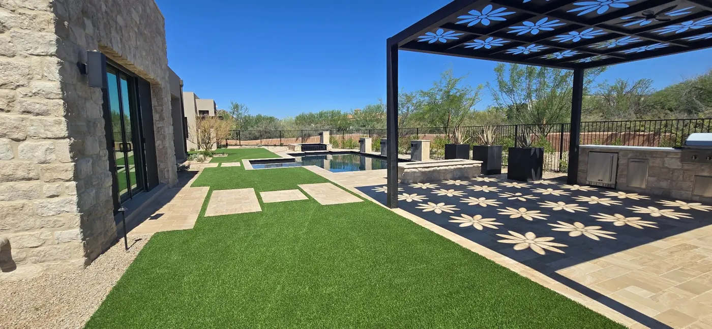 Pool, turf and shaded patio layout by L & R