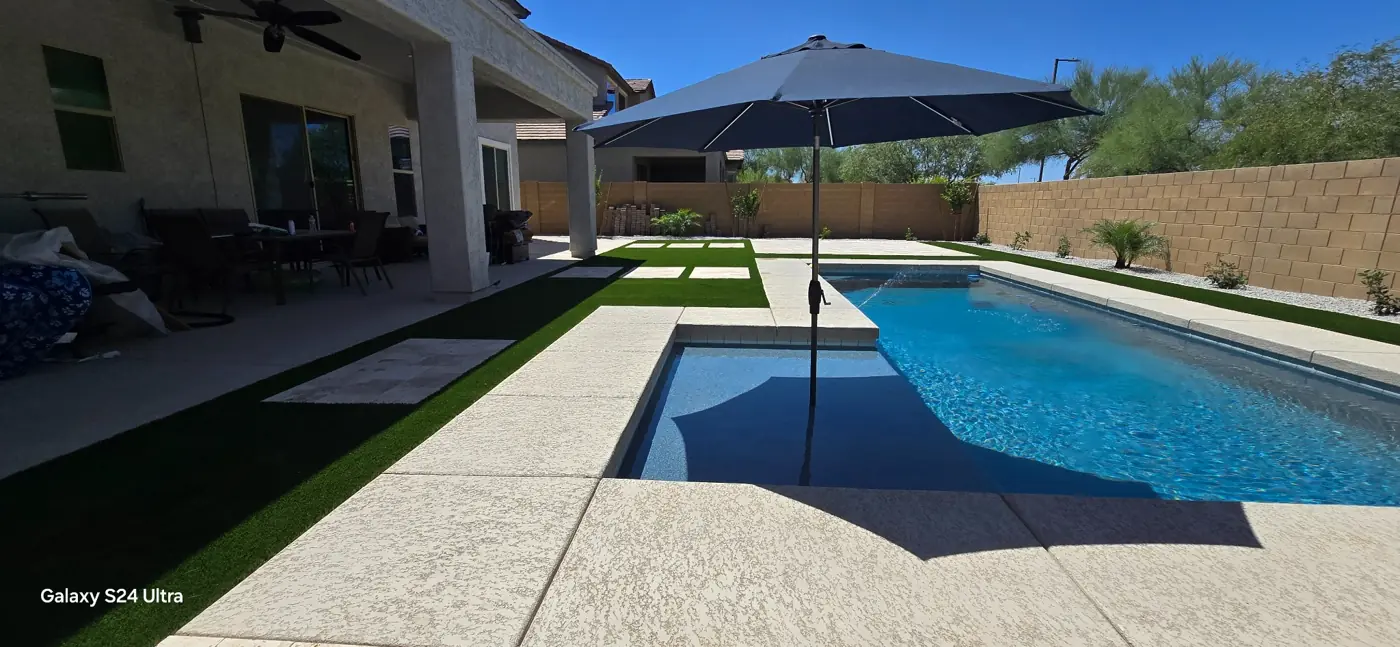 Pool with Baja shelf and umbrella by L & R