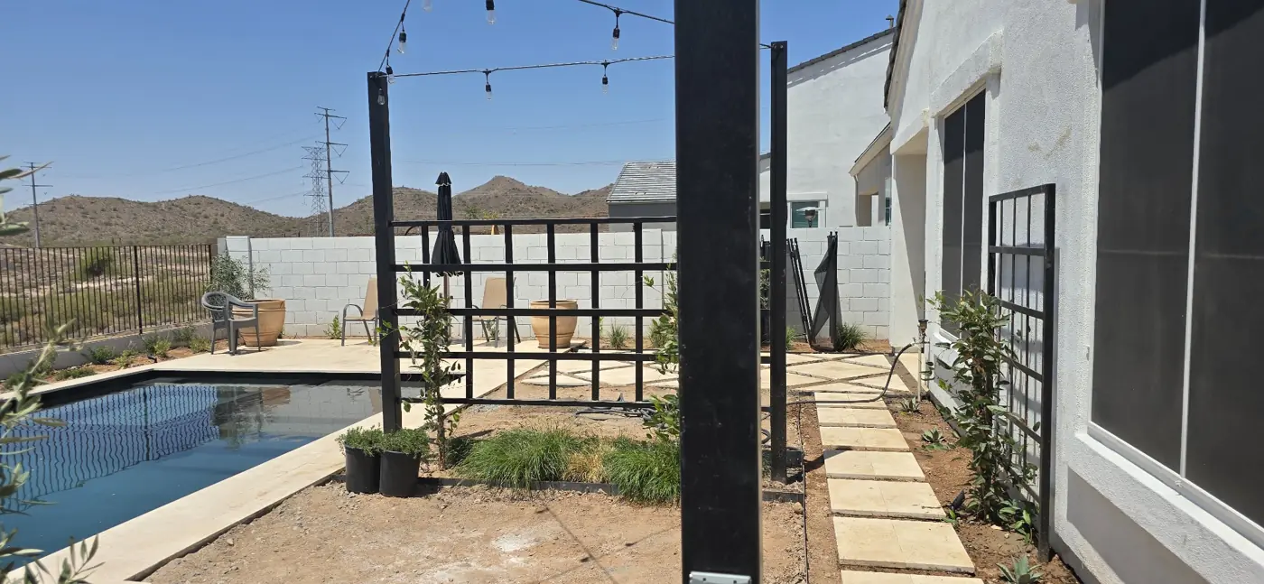 Poolside pergola and patio detail by L & R